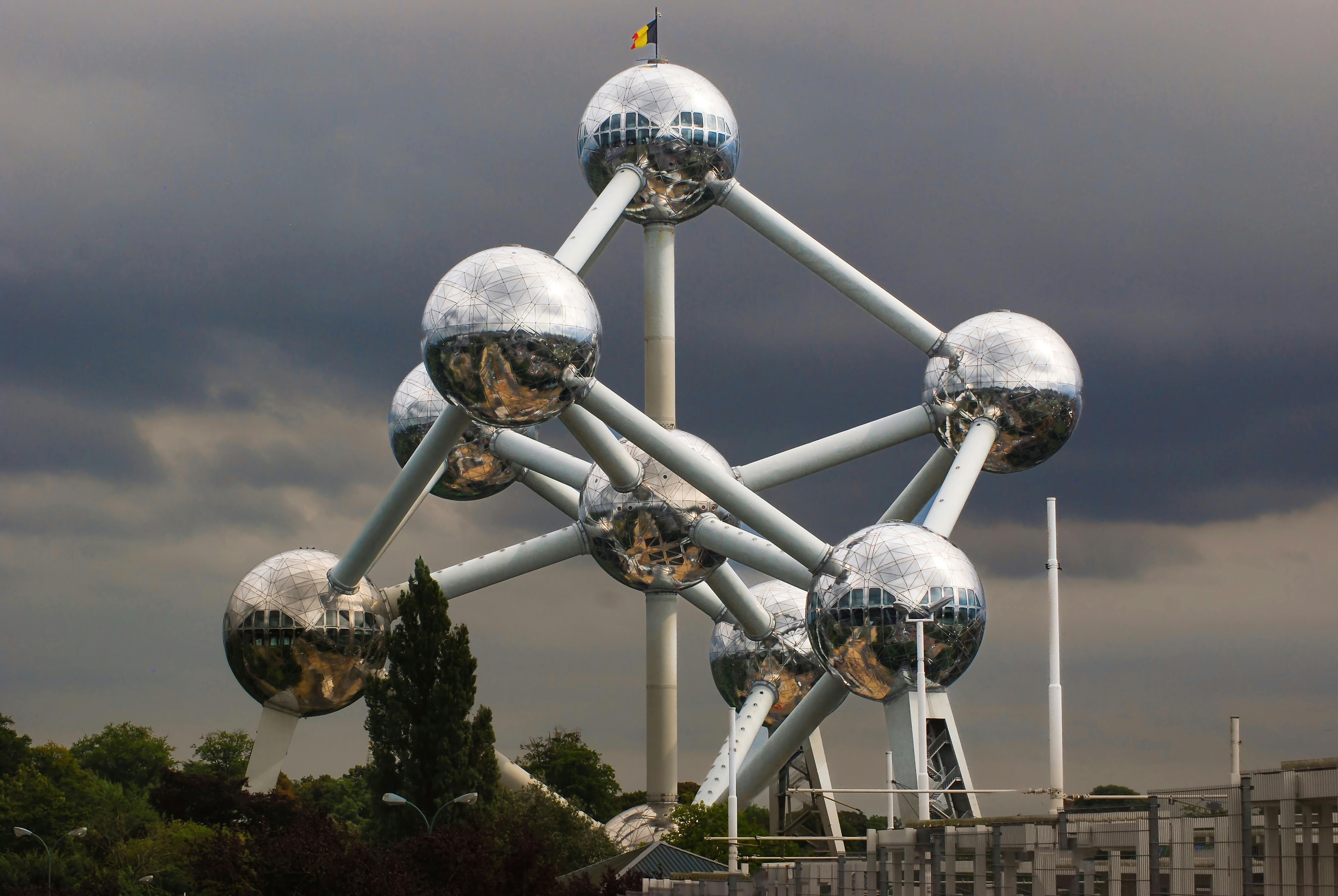 Brussels Travel Guide Futuristic steel sphere structure with city view