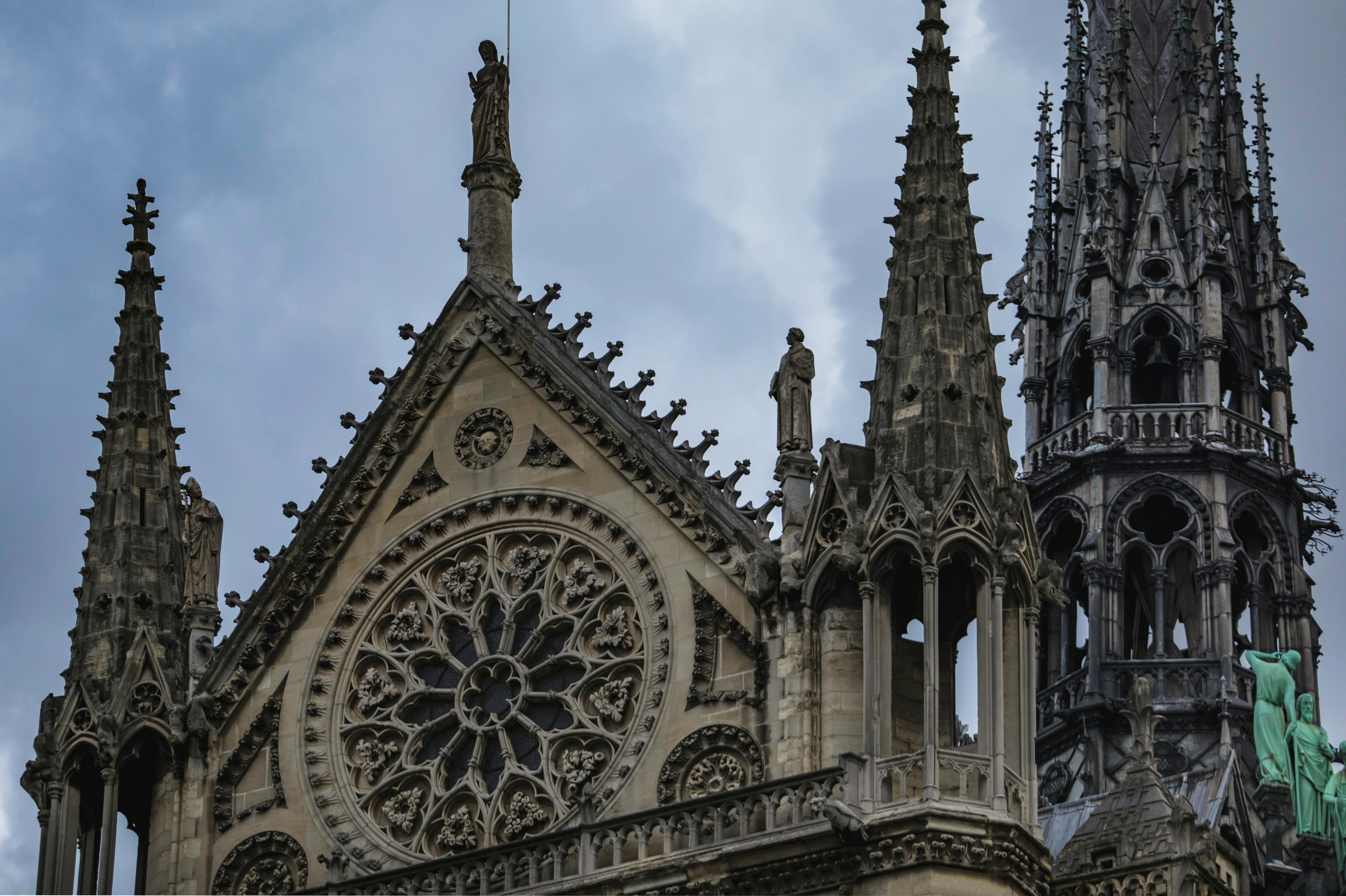 Paris Travel Attractions Gothic cathedral with stained glass windows and flying buttresses