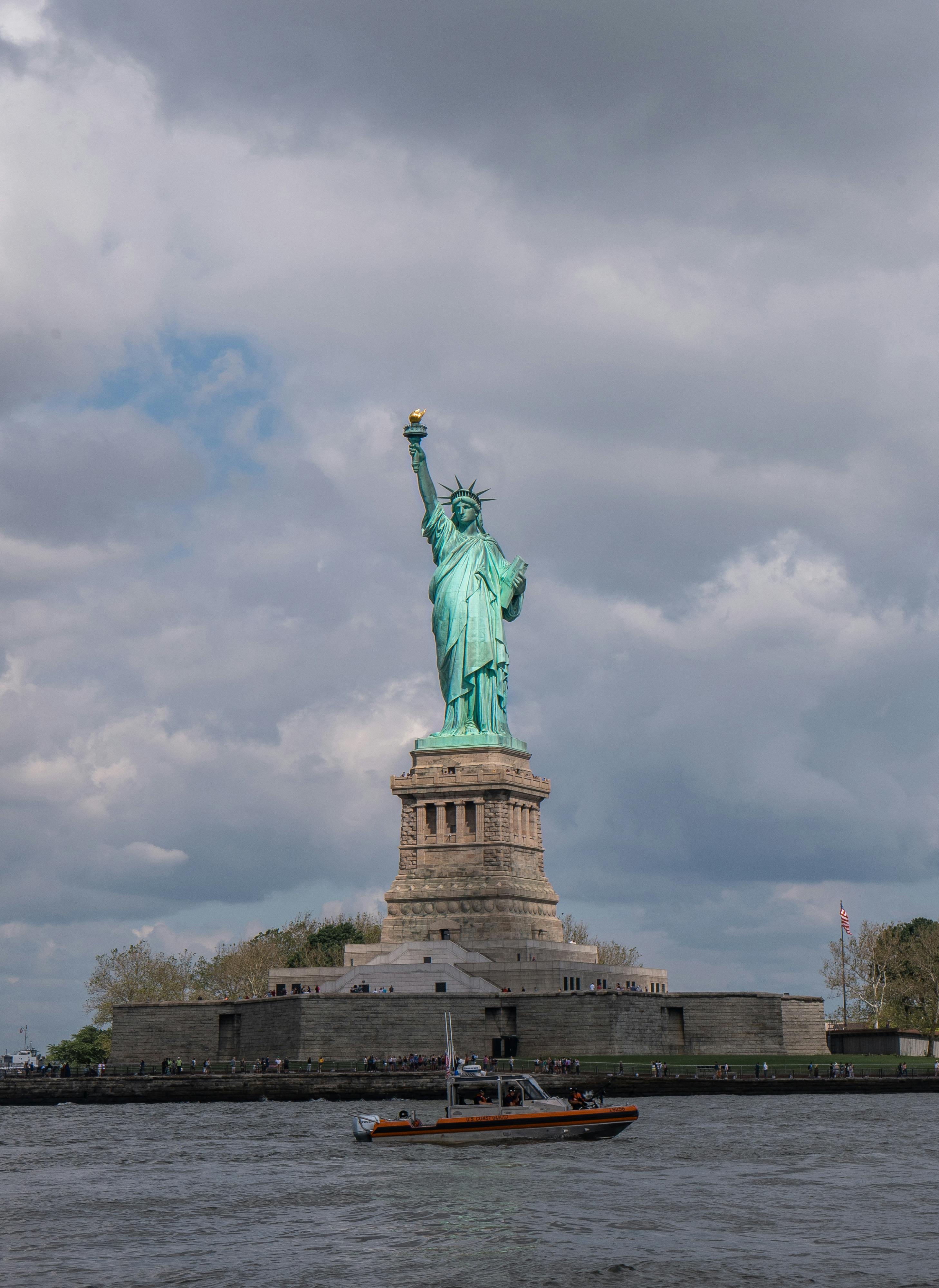 New York City Travel Guide Statue of Liberty on Liberty Island with harbor view