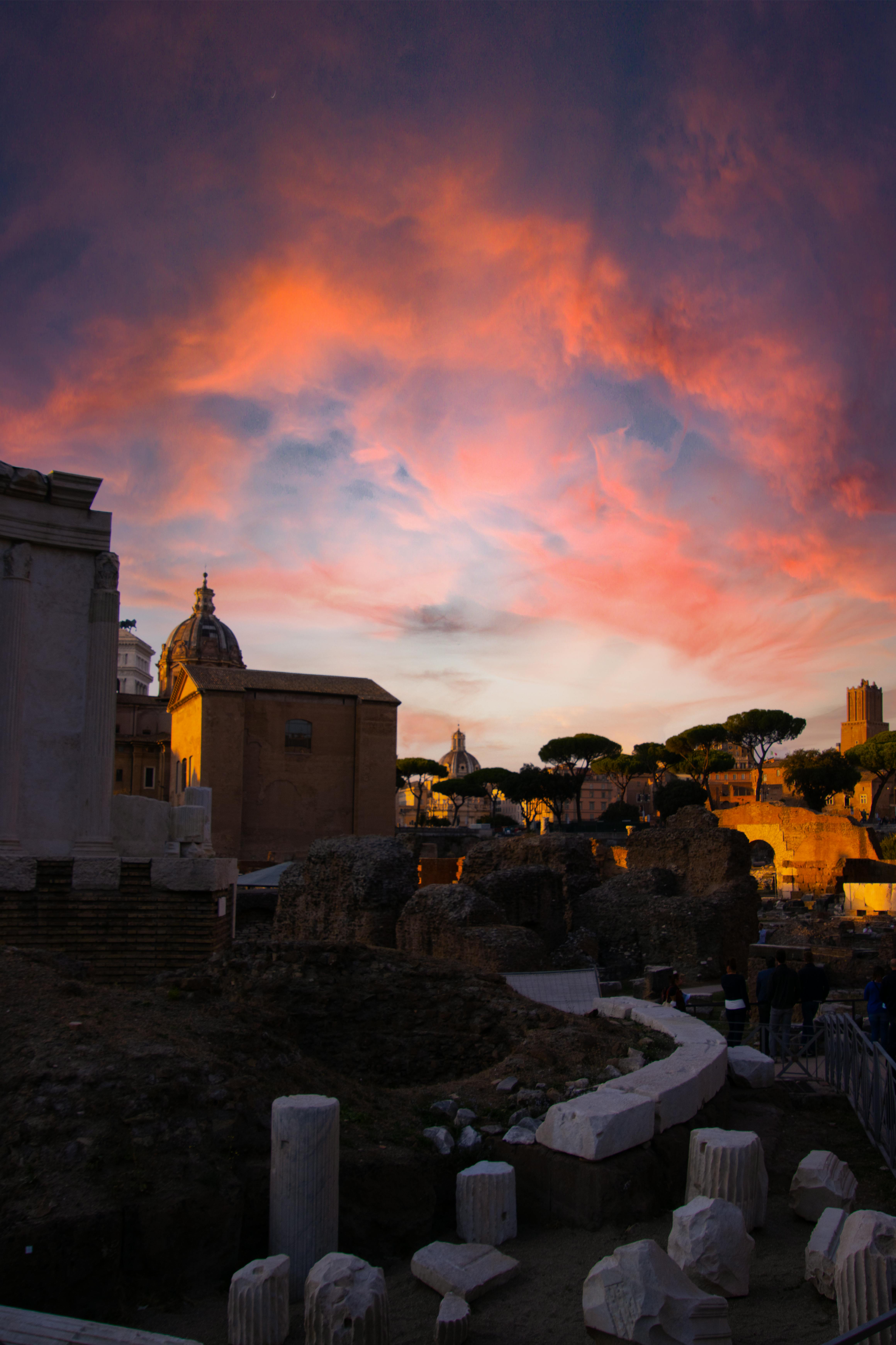 Rome Travel Guide historic cityscape with ancient ruins and vibrant streets